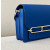 Hermes Roulis Mini Evercolor Jaune Amber (9D) Palladium Hardware Blue